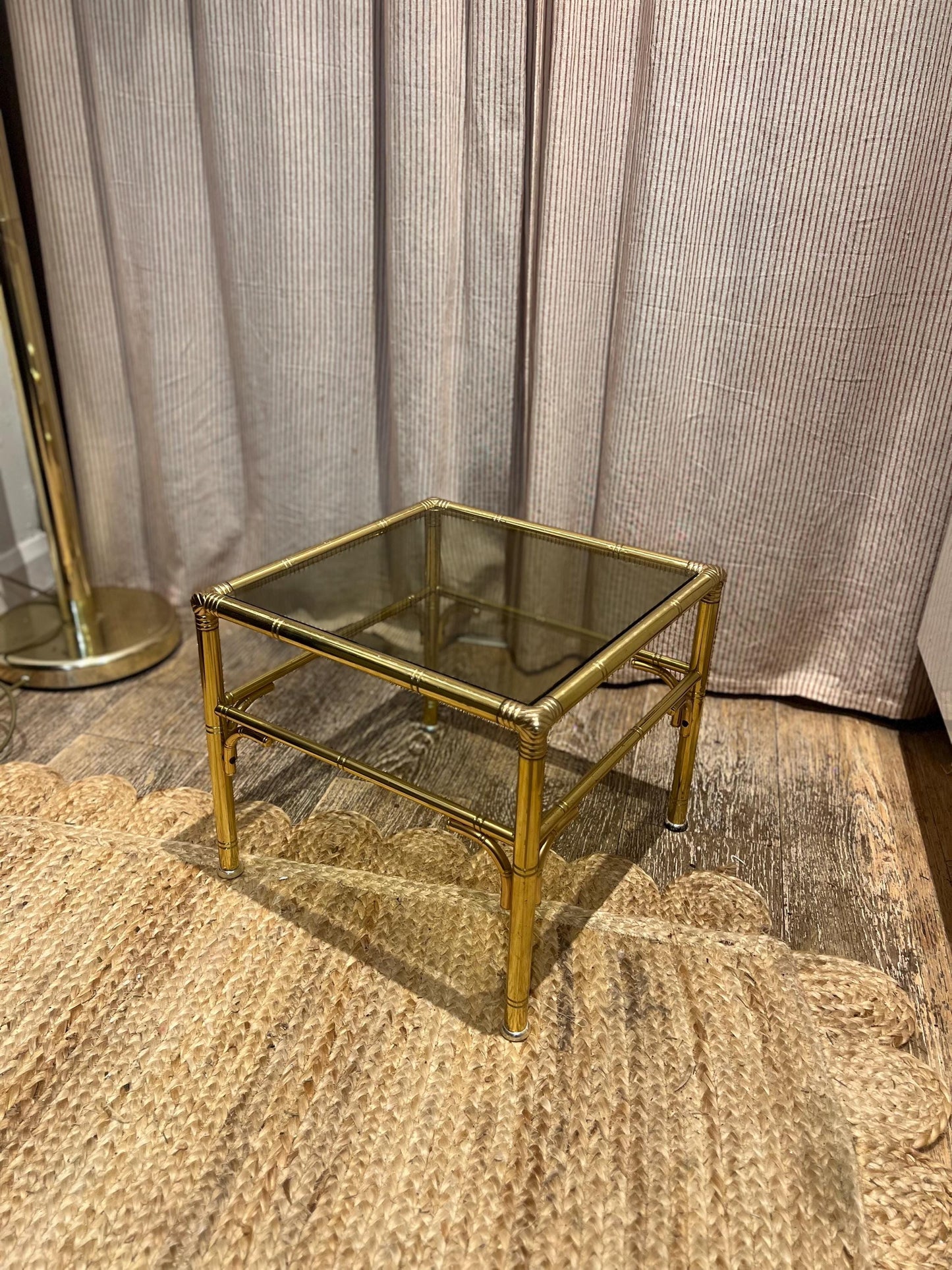Hollywood Regency style faux bamboo brass side table with smoky glass top