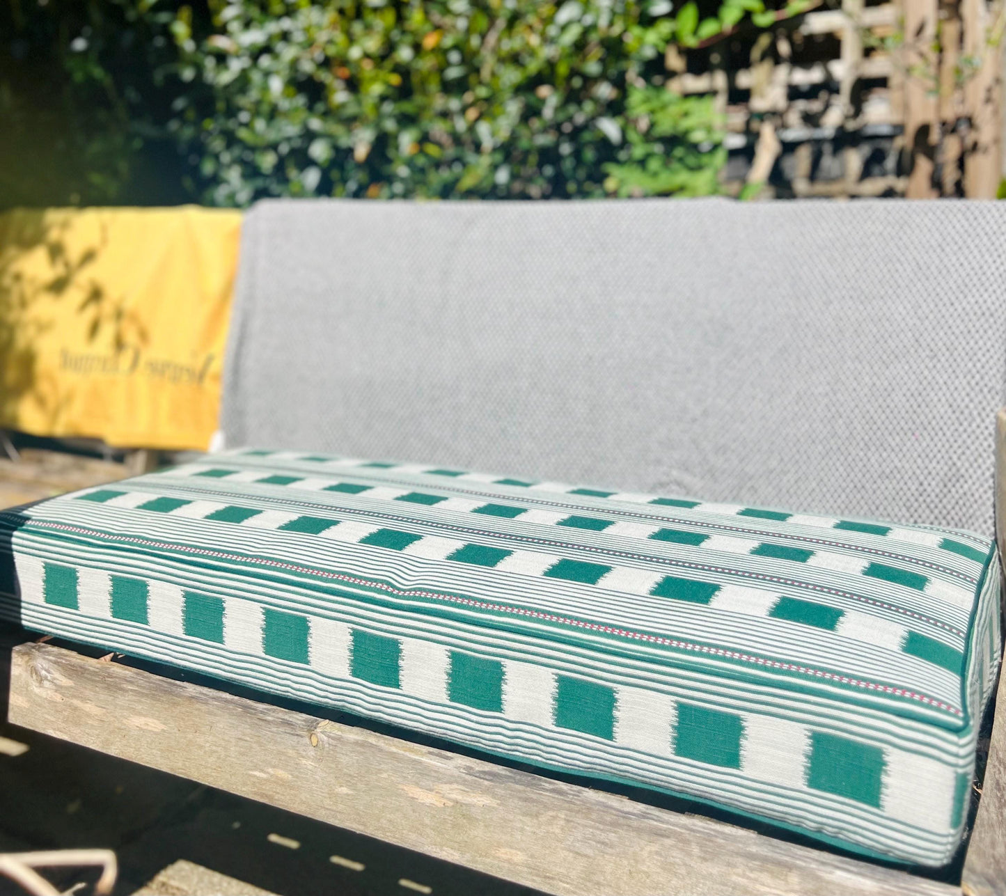Bespoke banquette cushions in Christopher Farr Cloth premium performance fabric for indoor and outdoor use