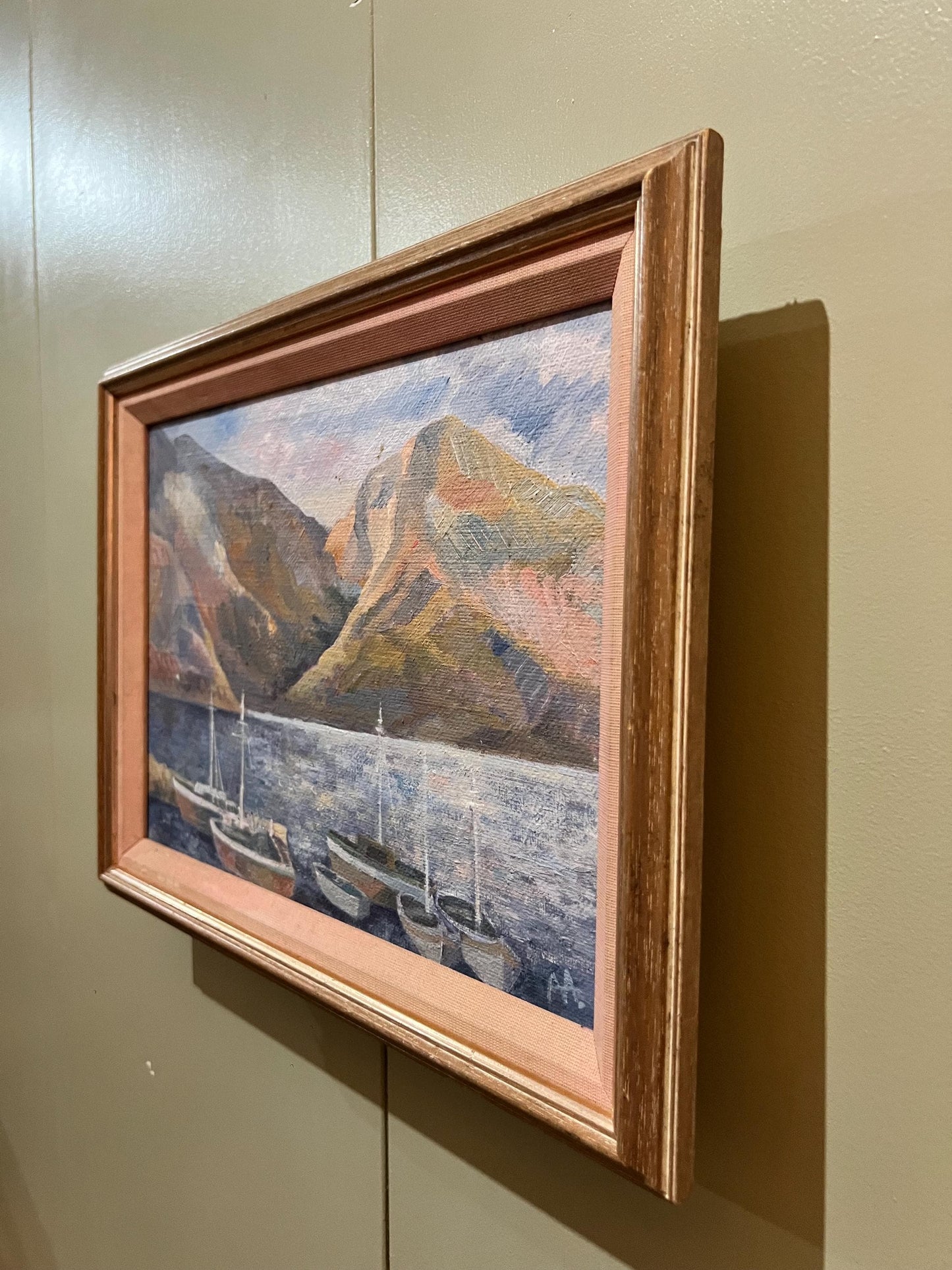 A charming coastal themed oil painting on canvas, framed and signed by the artist