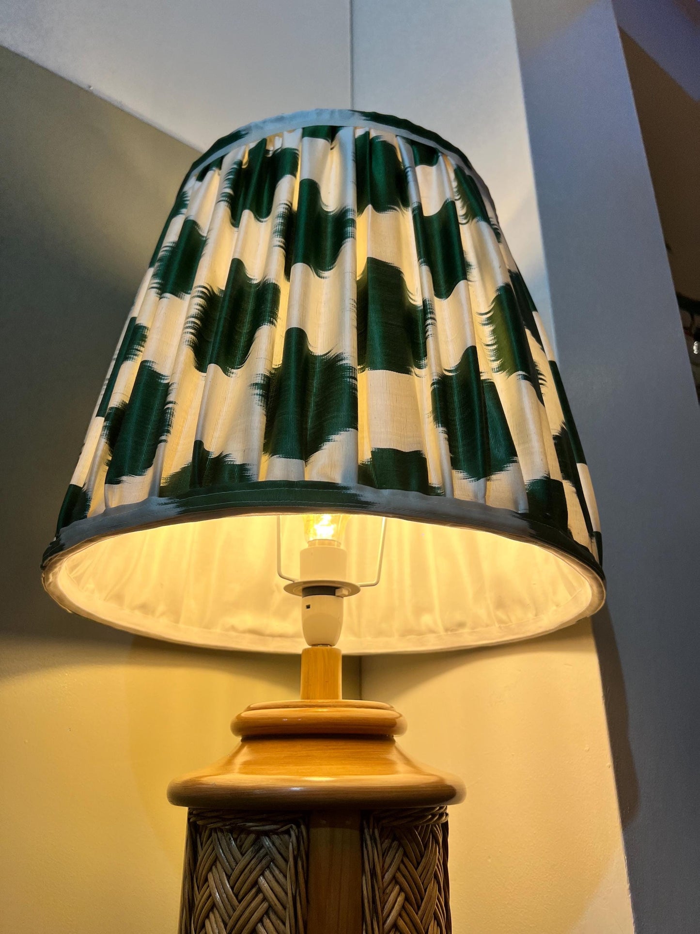 Vintage 1970s woven rattan floor-standing lamp, paired with a handmade blockprinted silk ikat lampshade.