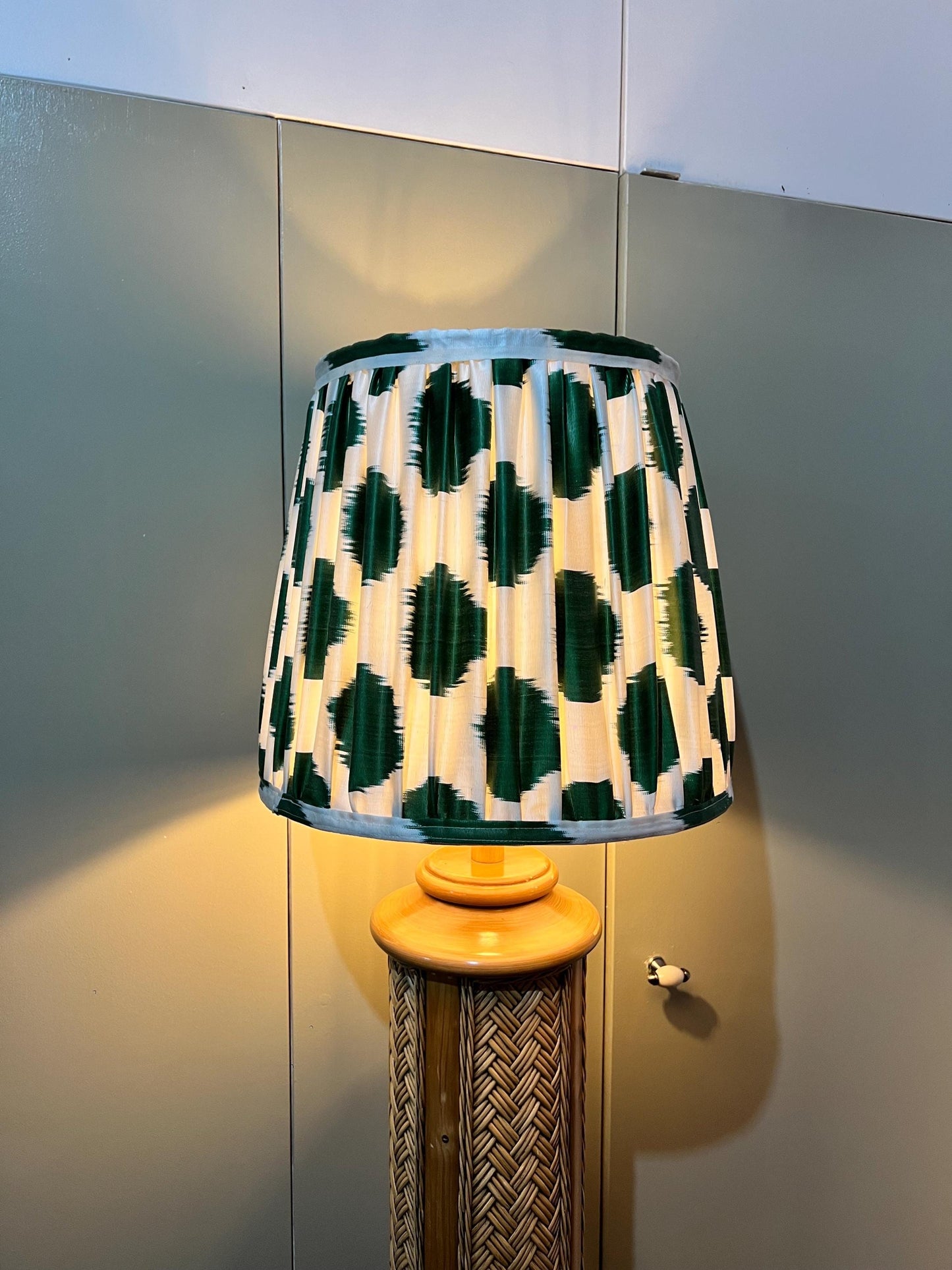 Vintage 1970s woven rattan floor-standing lamp, paired with a handmade blockprinted silk ikat lampshade.