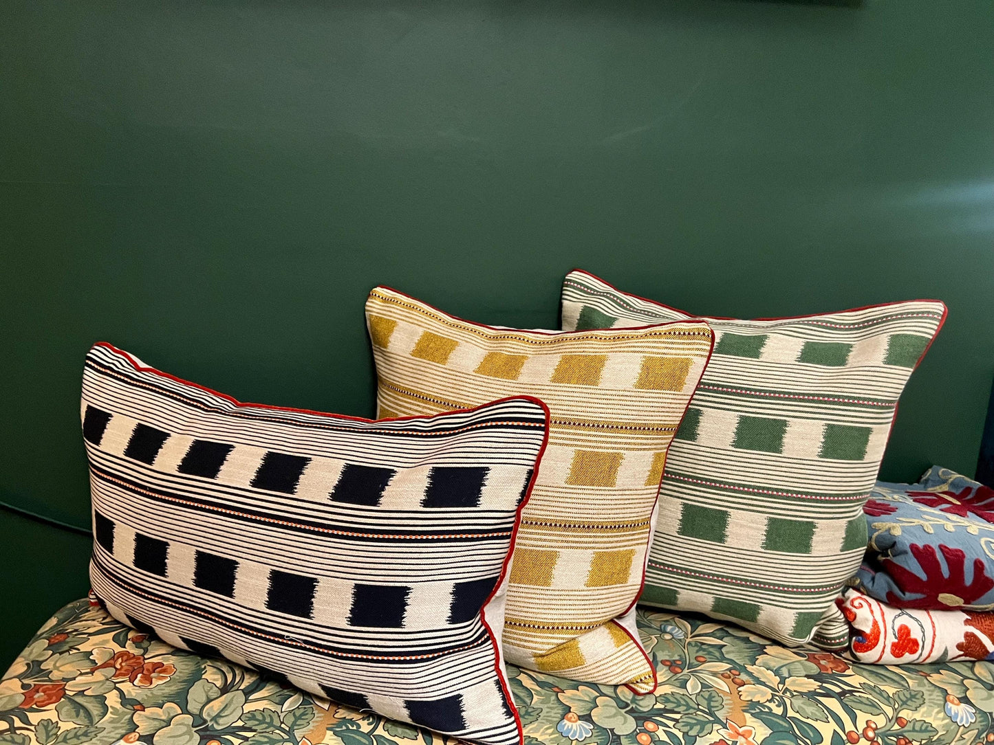 Handmade piped cushions in Christopher Farr Cloth Lost and Found by Kit Kemp