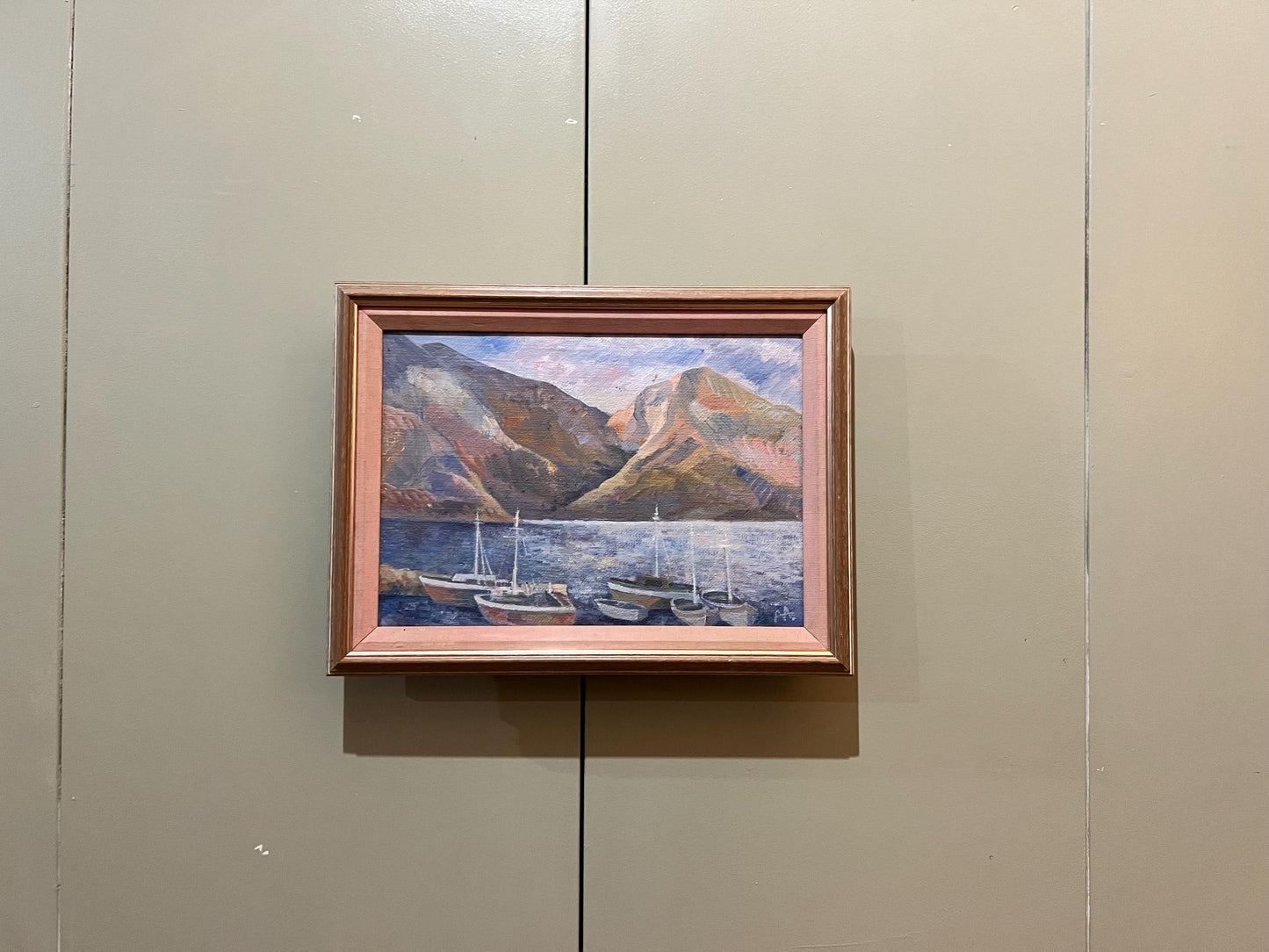 A charming coastal themed oil painting on canvas, framed and signed by the artist