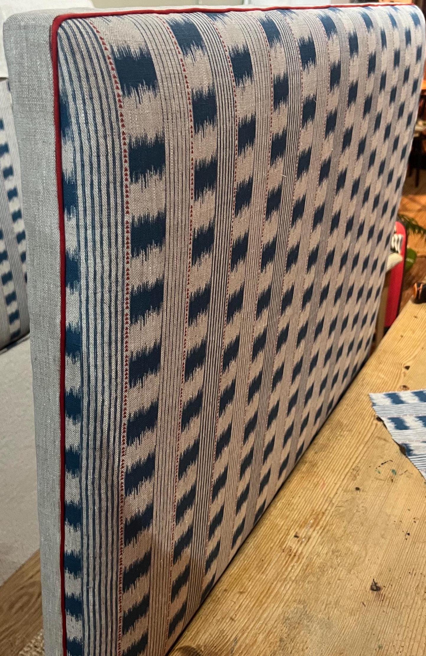 Bespoke Dakkar Ikat Stripe pure linen upholstered headboard with contrasting piping detail, in a choice of colours and sizes