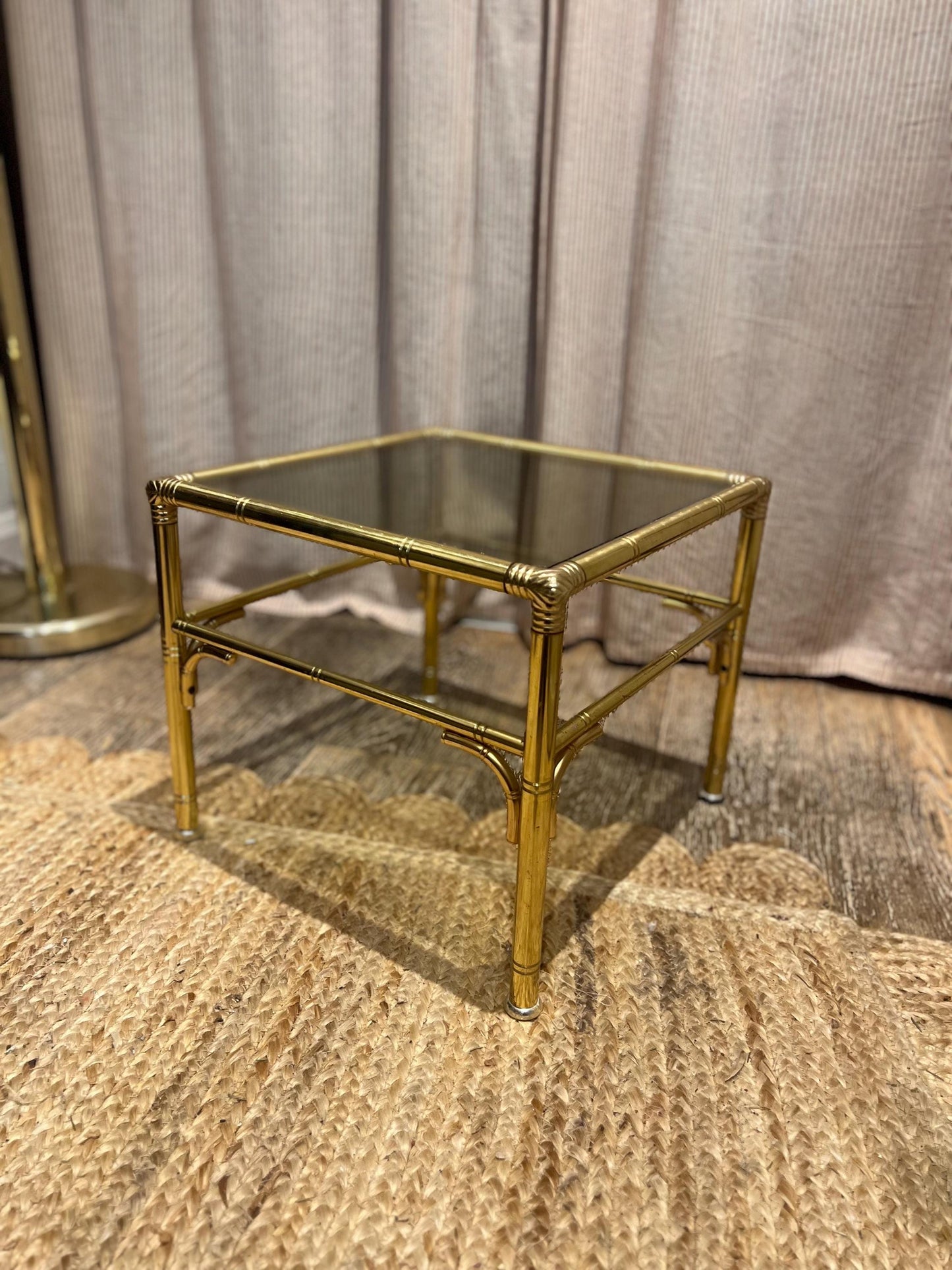 Hollywood Regency style faux bamboo brass side table with smoky glass top