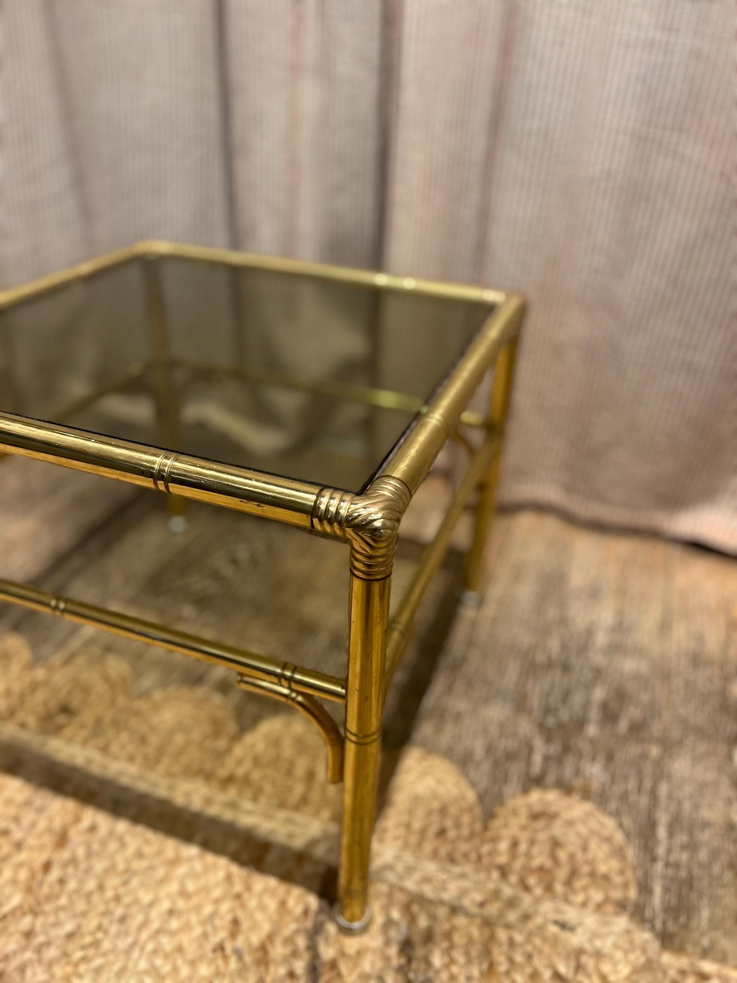 Hollywood Regency style faux bamboo brass side table with smoky glass top