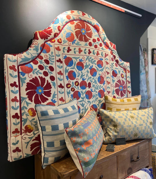 Bespoke luxury silk-embroidered Suzani upholstered headboard made to order