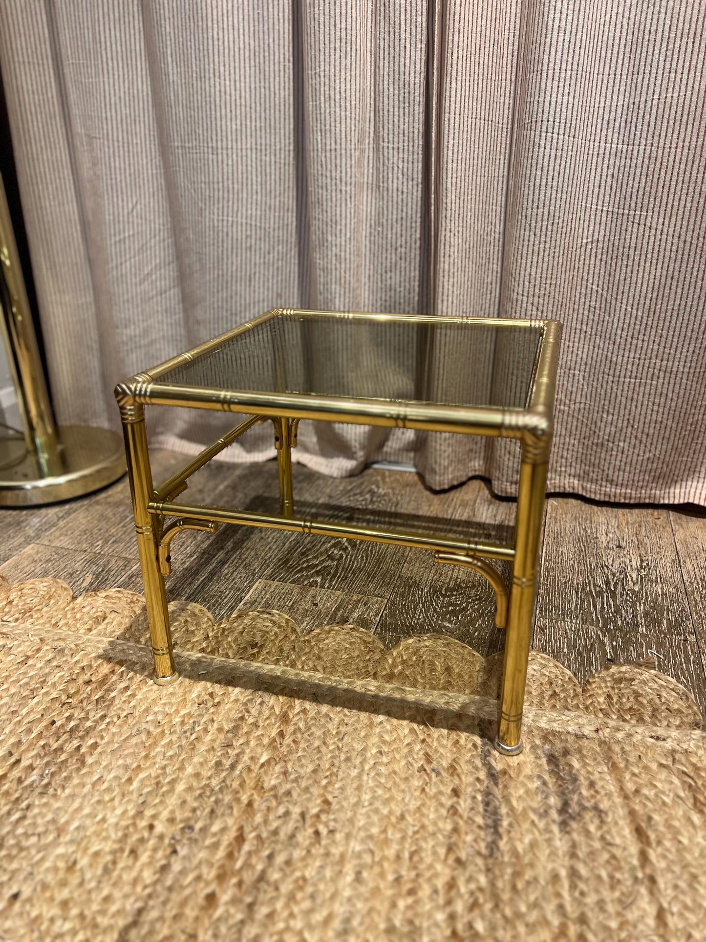 Hollywood Regency style faux bamboo brass side table with smoky glass top