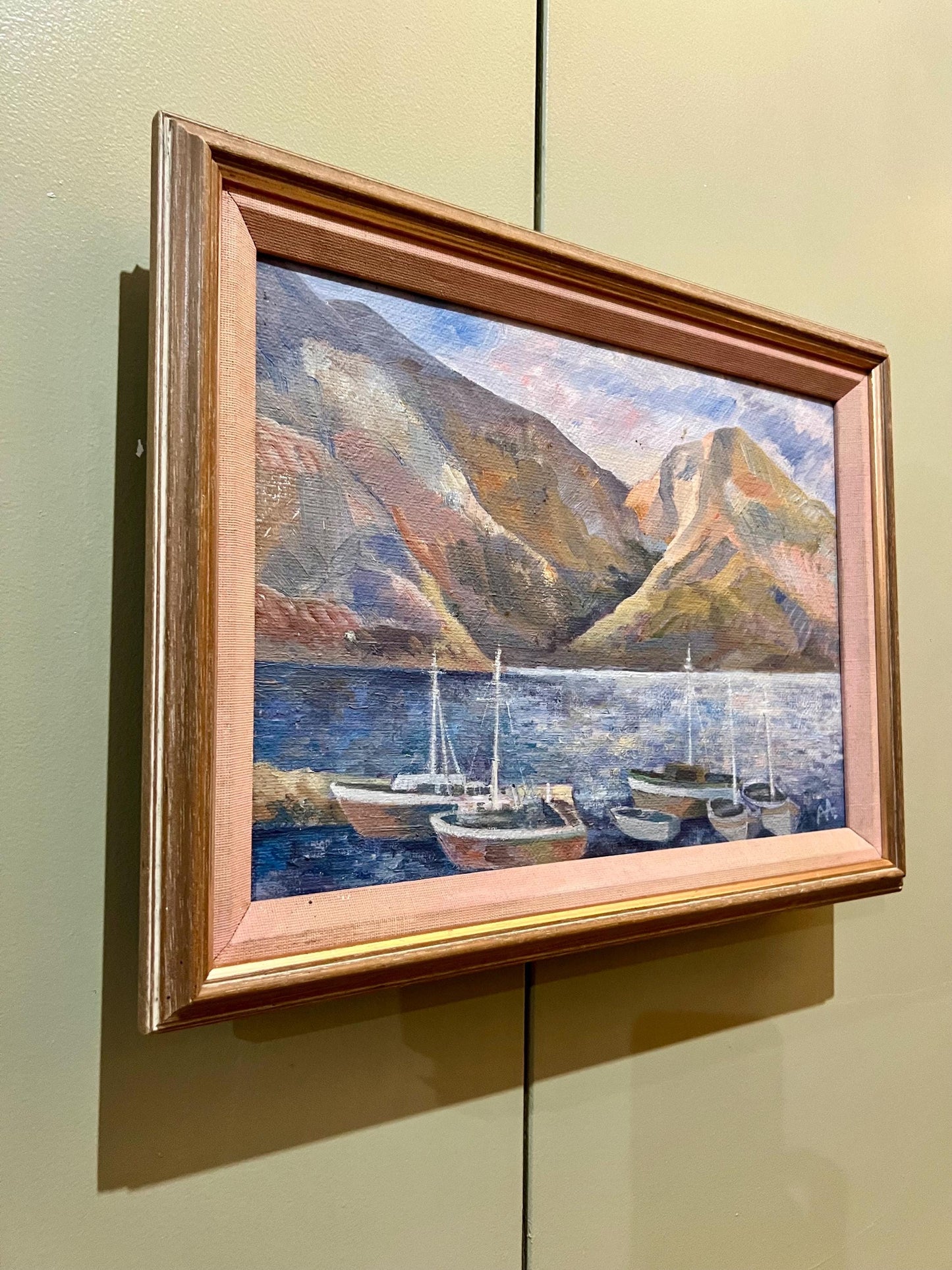 A charming coastal themed oil painting on canvas, framed and signed by the artist