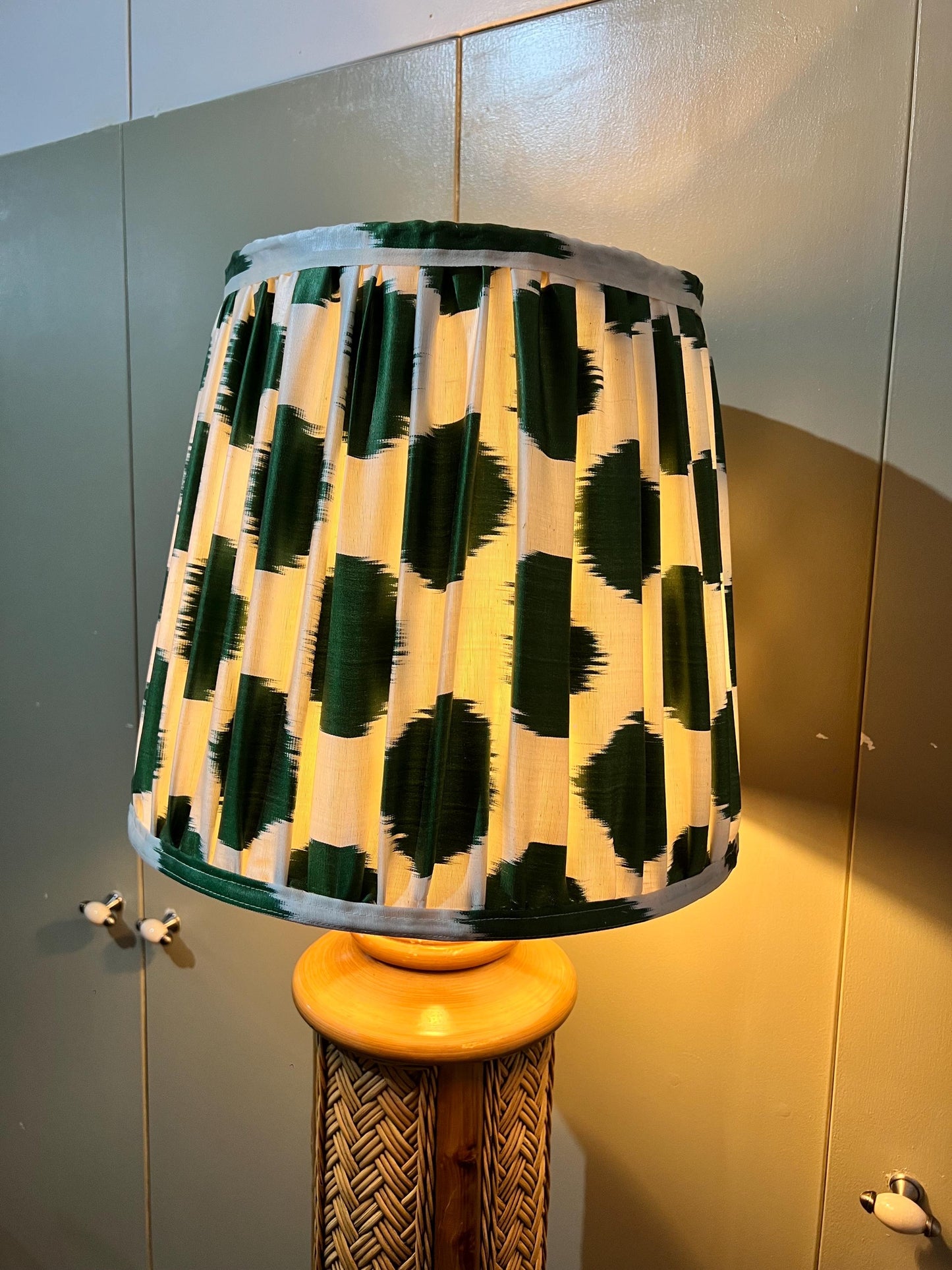 Vintage 1970s woven rattan floor-standing lamp, paired with a handmade blockprinted silk ikat lampshade.