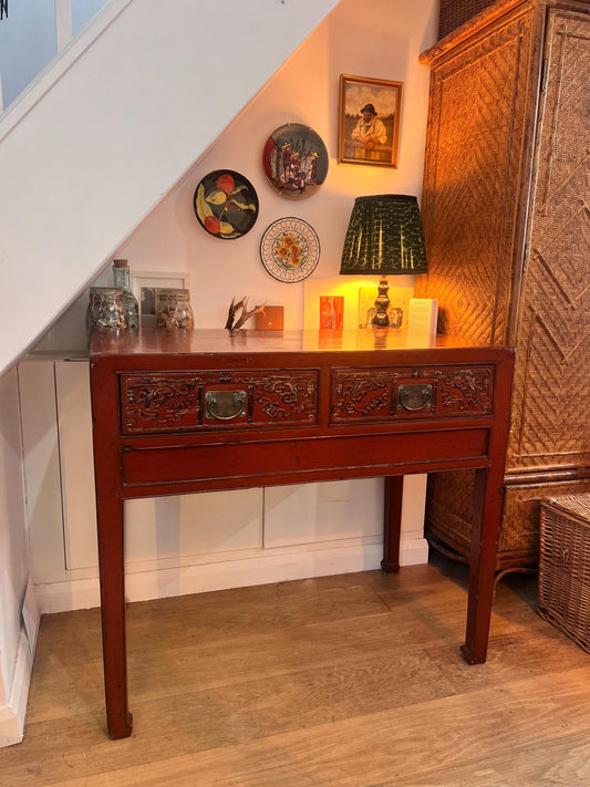 Stunning vintage oriental burnt orange lacquered console table with two drawers