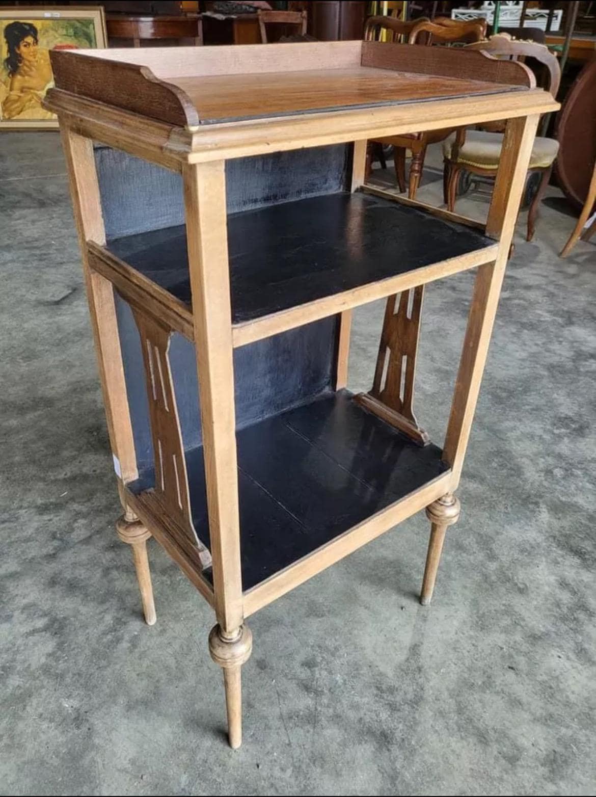 Mid-20th Century two tier side table with elegant turned legs