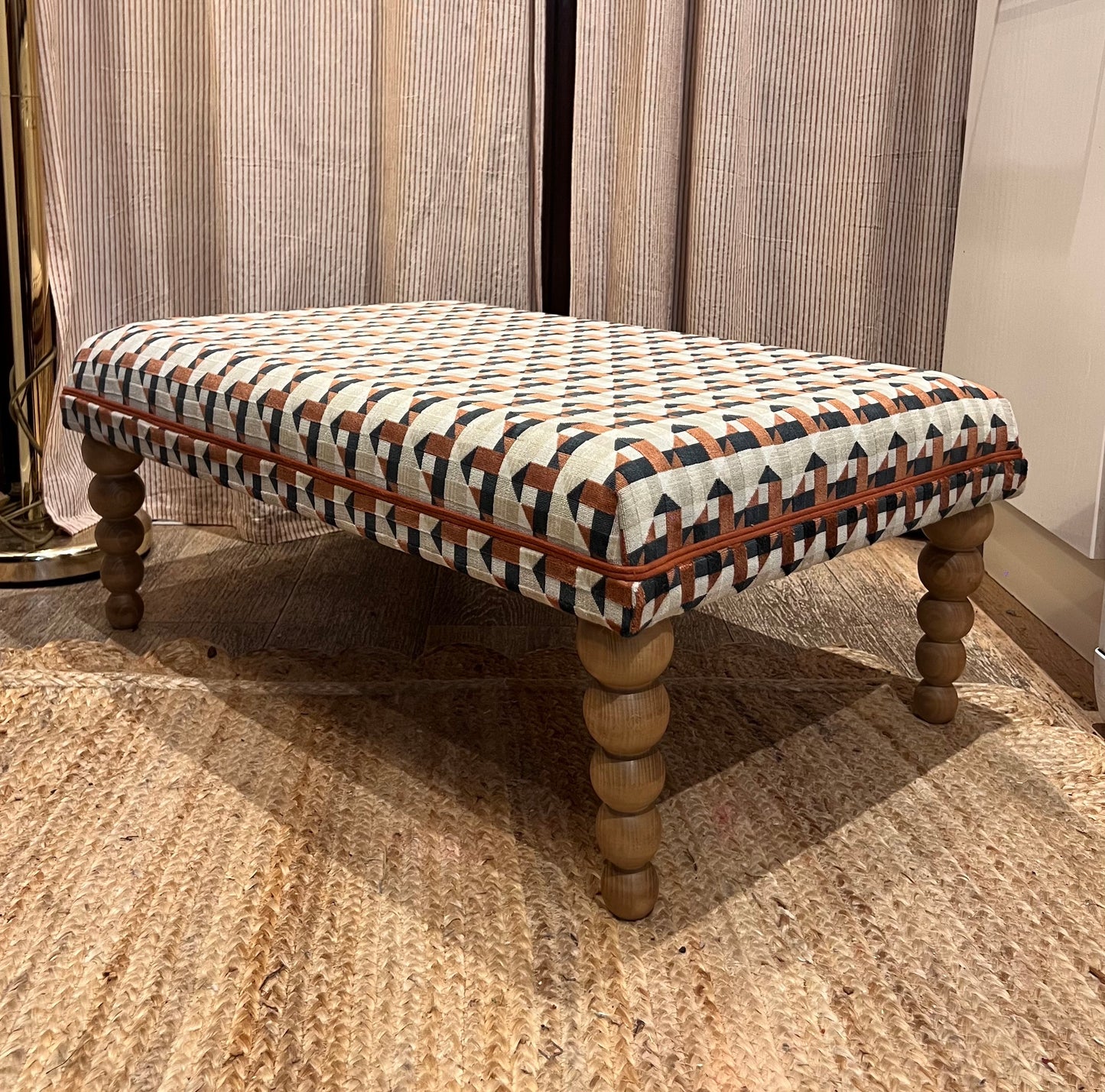 Bespoke Footstool / Ottoman in customers own fabric, custom sizes available and a choice of turned wooden legs