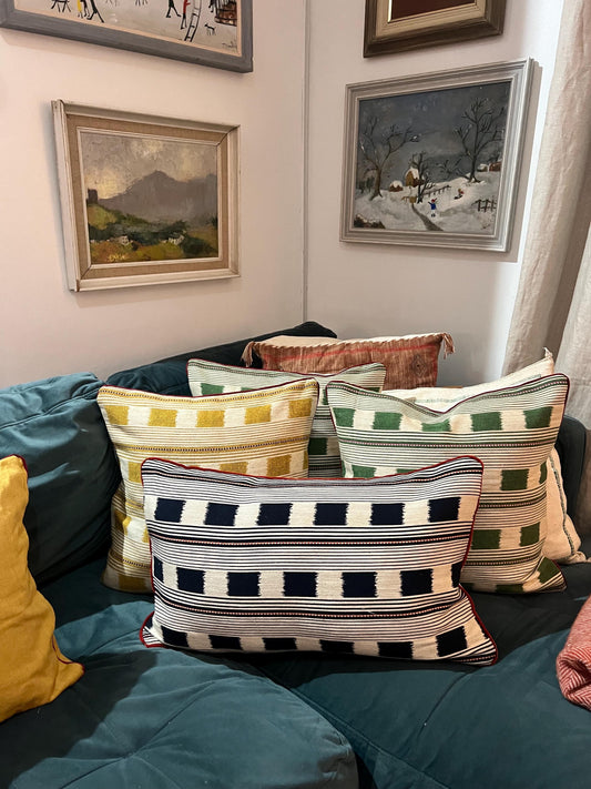 Handmade piped cushions in Christopher Farr Cloth Lost and Found by Kit Kemp