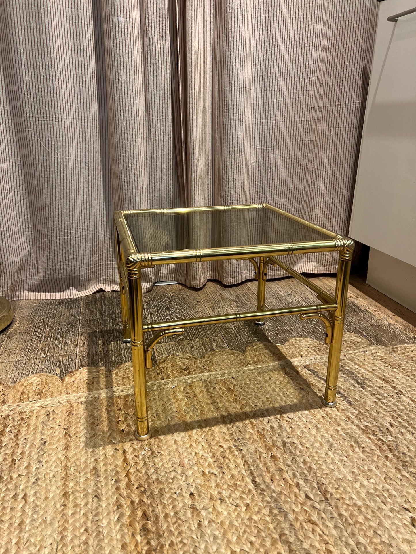 Hollywood Regency style faux bamboo brass side table with smoky glass top