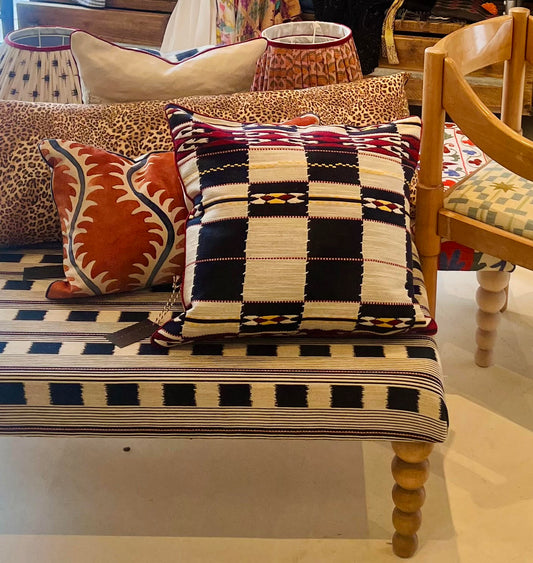 Handmade piped cushions in Christopher Farr Cloth Chubby Check by Kit Kemp