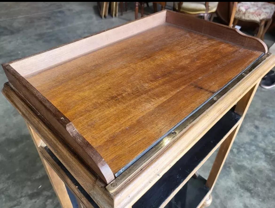 Mid-20th Century two tier side table with elegant turned legs